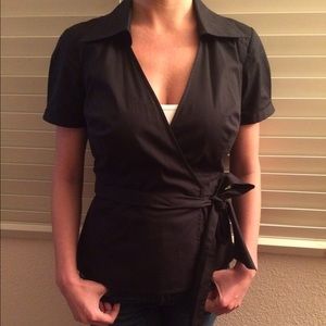 Black crossover wrap top.