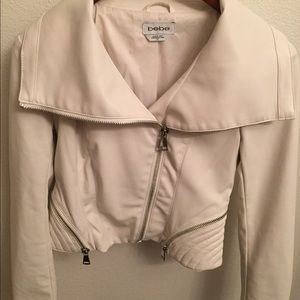 White leather blazer.