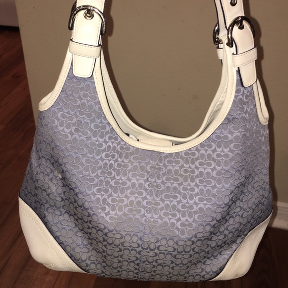 Blue jean blue and leather ivory trimmed Coach 💙