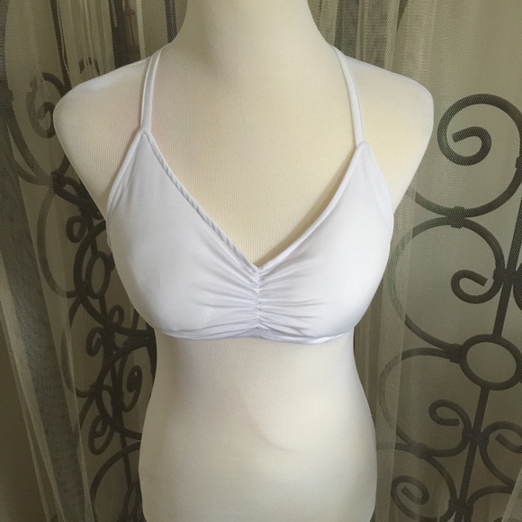 Tops - NEW..strappy bra with criss cross back..SZ large