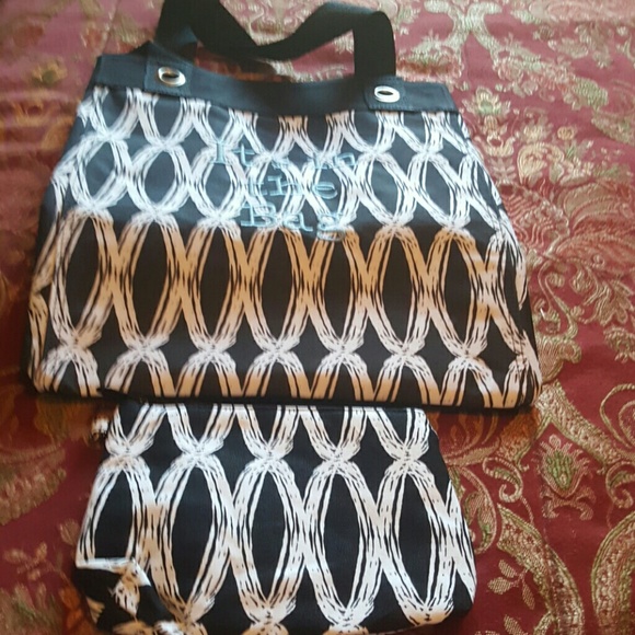 Thirty one tote and nine zipper pouch