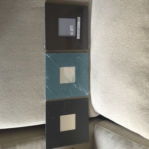 Three separate square mirrors from Ikea