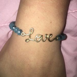 Stretchy blue "LOVE" bracelet