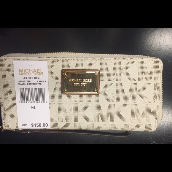 Large Monogram MK wristlet/wallet in vanilla