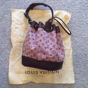 Louis Vuitton wrist buckle bag