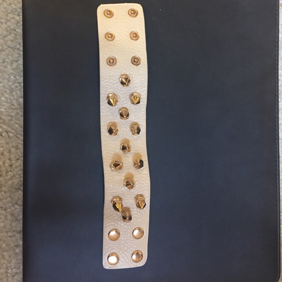 Gold Studded cream bracelet with cones and skulls - Picture 1 of 1
