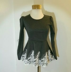 Long sleeve , peplum, lacey party top