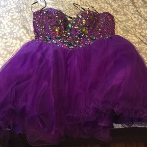A short cute purple dress.