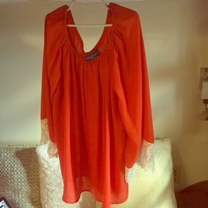 Orange flowy top w wide Sleeves