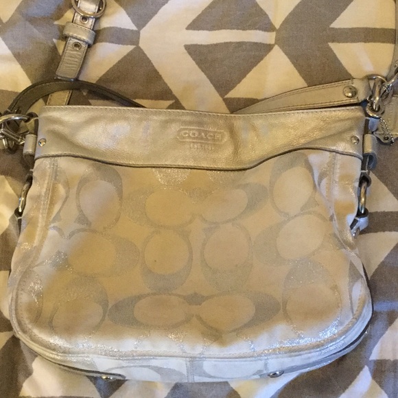 Silver and white coach cross body purse