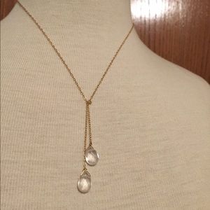 14k gold chain and Swarovski crystal necklace.