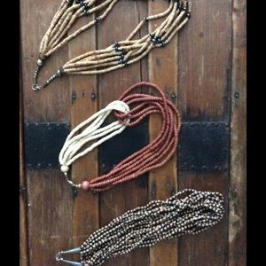 3 necklaces with wood and glass beads