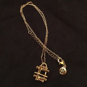 Tory Burch black and gold necklace