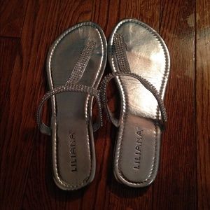 Silver flip flops with gems
