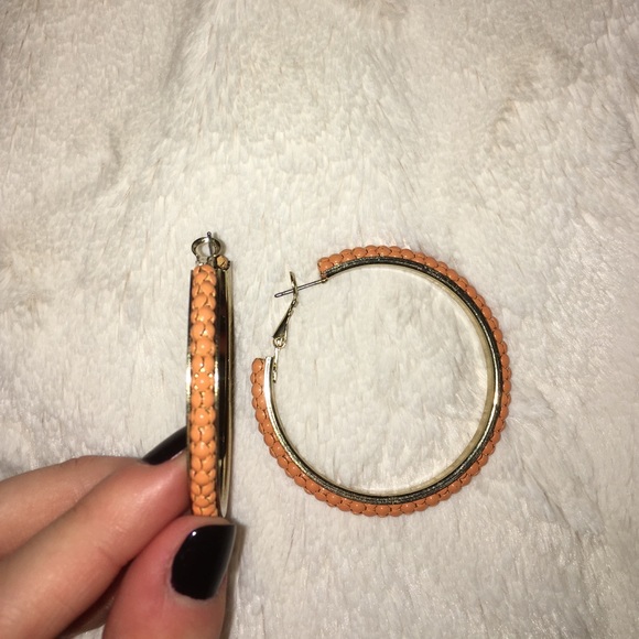 Orange hoop earrings