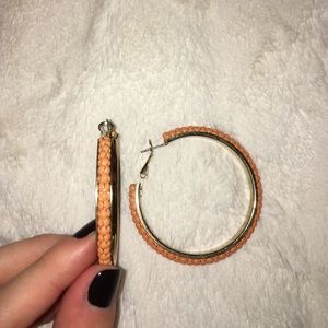 Orange hoop earrings