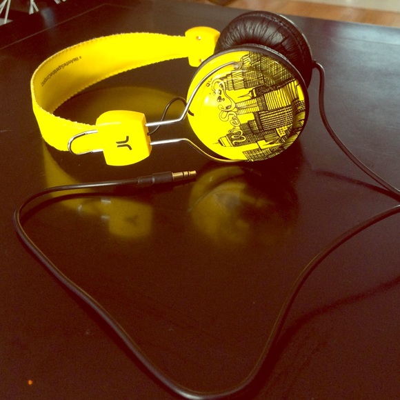 WeSC yellow headphones