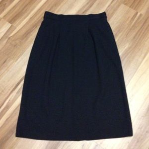 Dressy black knit skirt with pleats at top