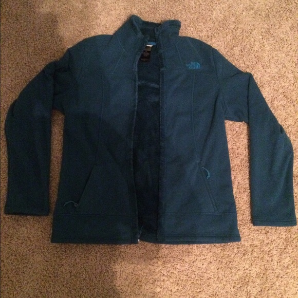 Dark real woman's north face jacket