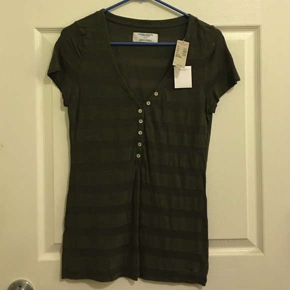Striped buttoned v neck shirt NWT