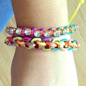 2 bracelets that are colorful.