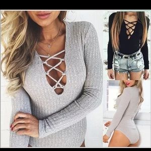 Gray long sleeve cross body suit