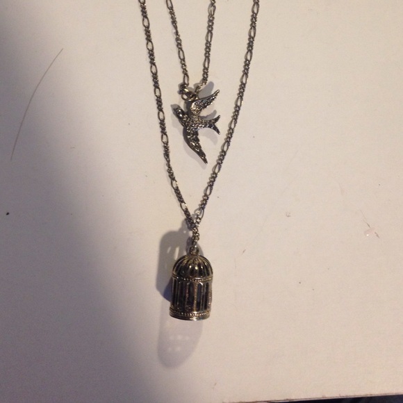Bird and cage necklace