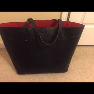 Black and red reversible tote bag