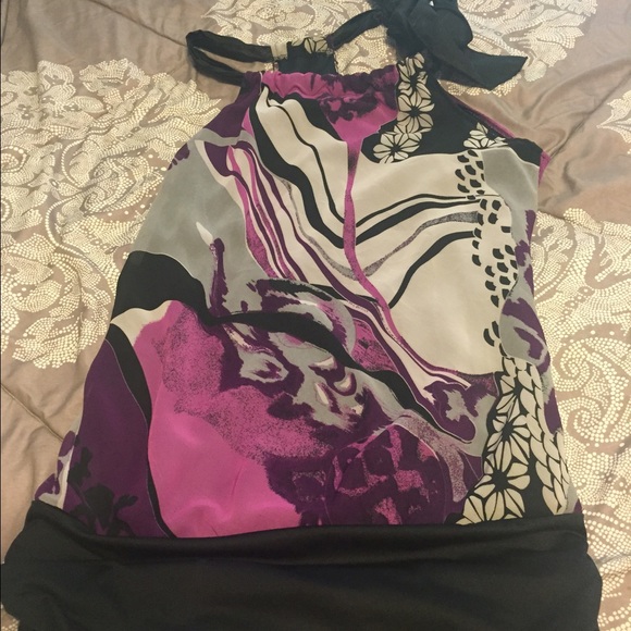 Multi colored blouse ties around the neck