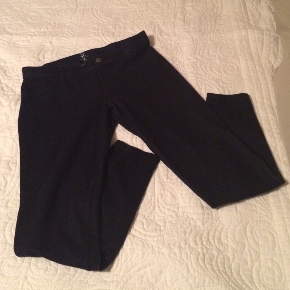 Black denim like jeggings.