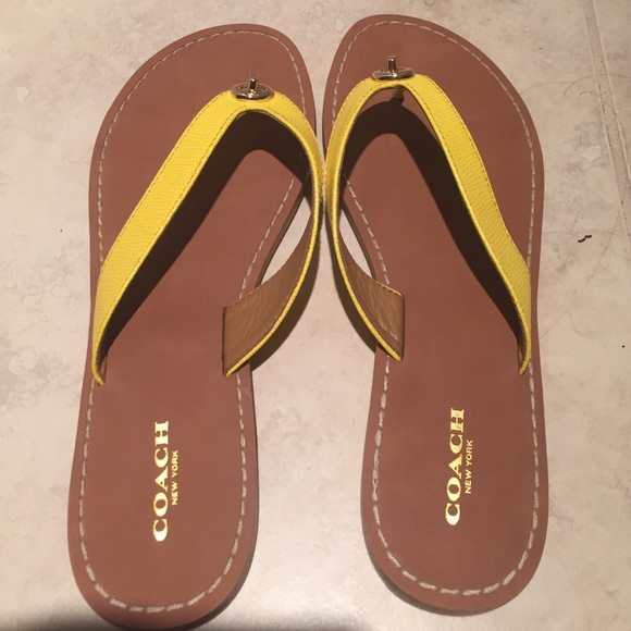 Brand new Size 8 coach leather sandals in yellow