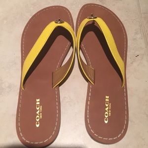 Brand new Size 8 coach leather sandals in yellow