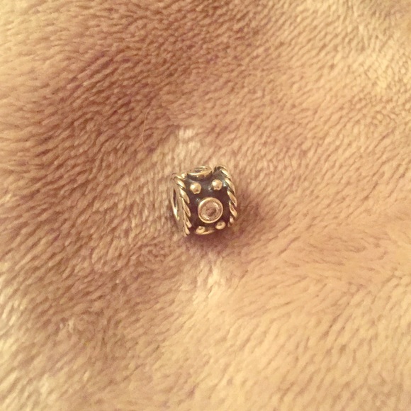 Retired Pandora radiant charm. Silver/CZ