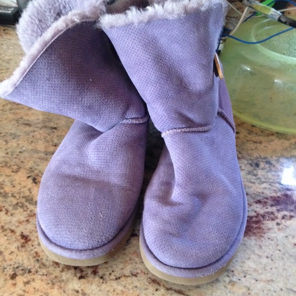 Woman's purple Ugg boots size 9.