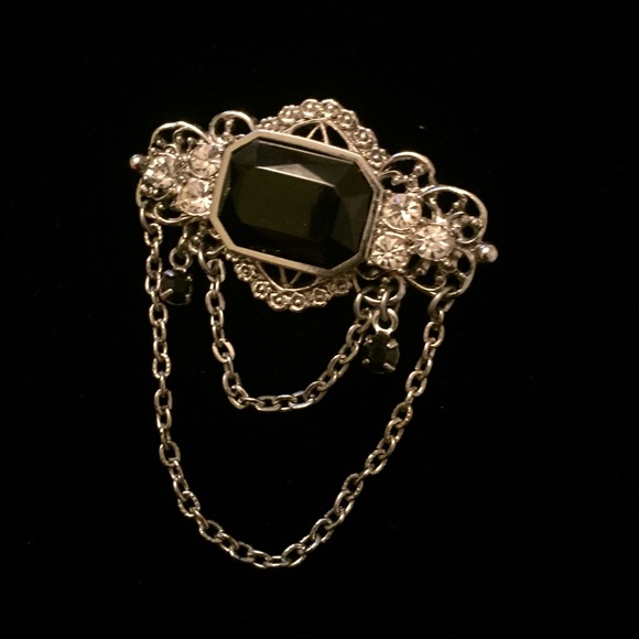 unique silver tone brooch