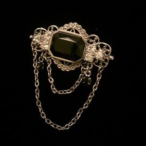 unique silver tone brooch