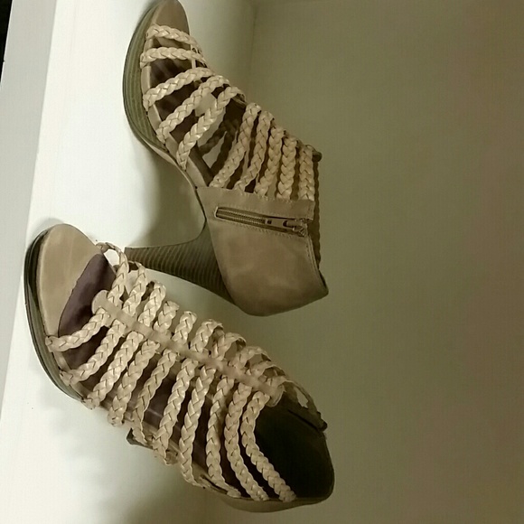 Bone colored strappy heels that zip