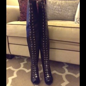 Black Thigh High Lace Up Boots.