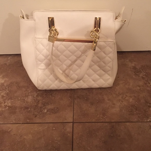 Brand new white charming Charlie bag