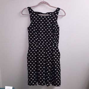 Black dress with bow cut outs in the back