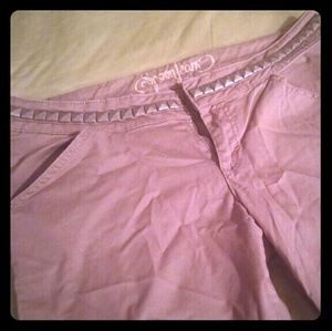 Tan pants with gold studs around waist