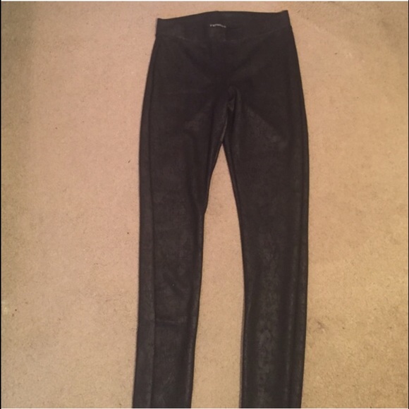 Black snakeskin scuba leggings from express.