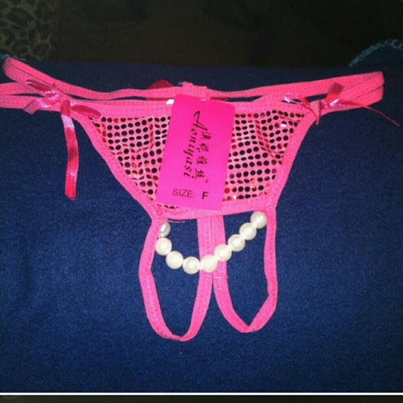 Risqu?  crotchless  hot pink undie...