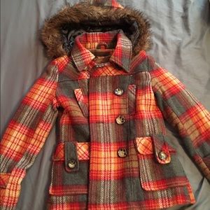 Bright multicolored coat, faux fur hood.