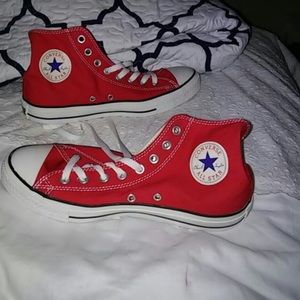 Converse high top sneakers.
