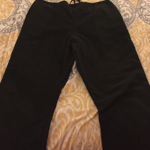 Two pair of black scrub pants