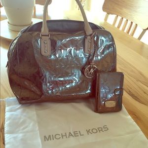 Used Michael Kors jet set bag with new wallet.