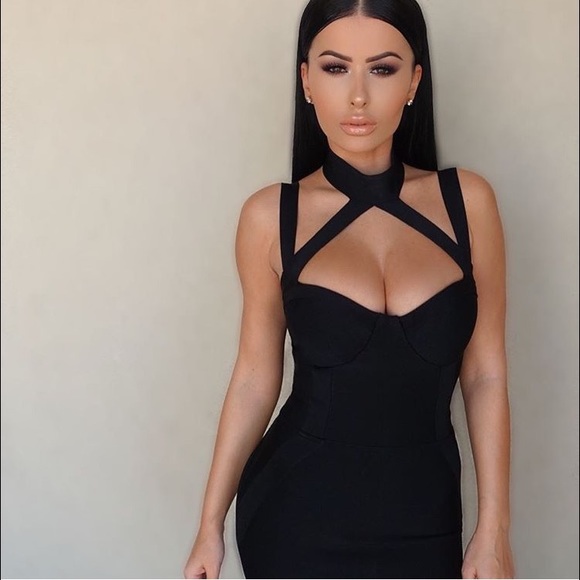 bebe Dresses & Skirts - Black HL Bandage dress