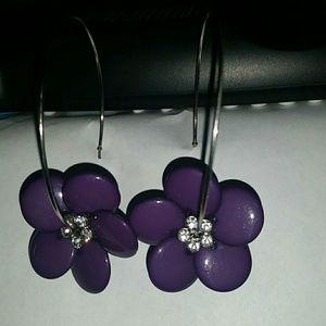 Dangling purple flower hoop earrings