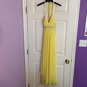 Yellow floor length gown, tie behind the back
